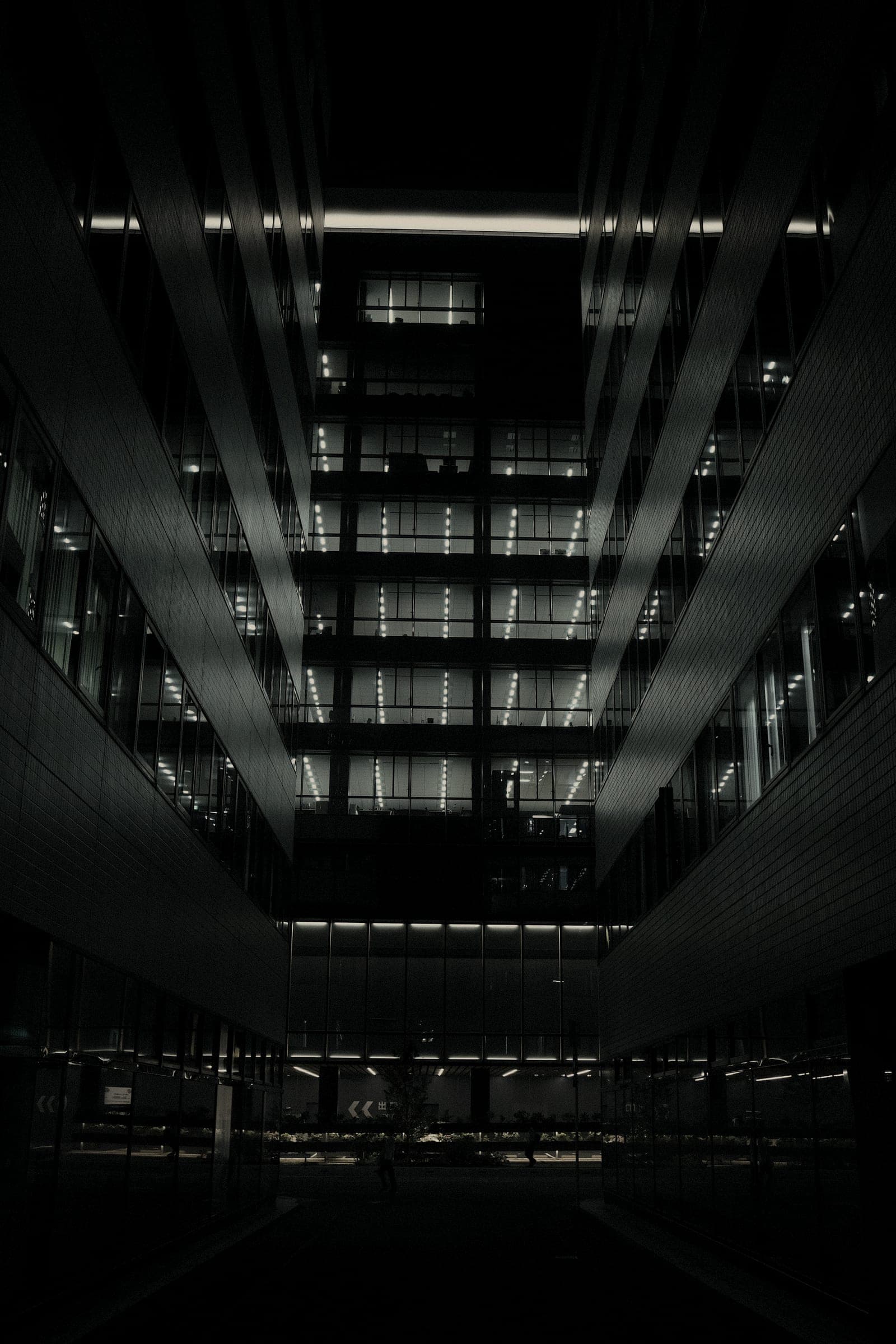 Dark modern office interior with geometric lighting